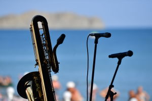 Microphones and a saxophone lay on the stage ahead of a concert at the Koktebel Jazz Party-2021 international music festival